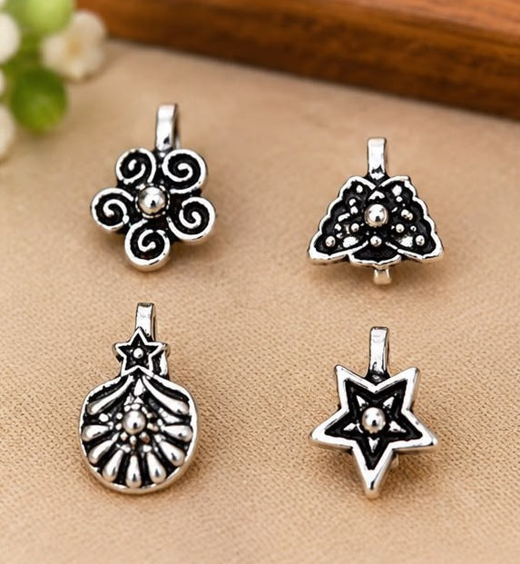 Oxidised Star & Swirl Nose Pin