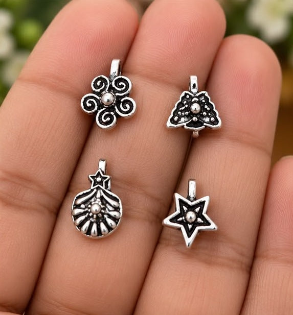 Oxidised Star & Swirl Nose Pin